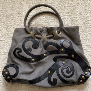 JLo grey pebbled leather hand bag